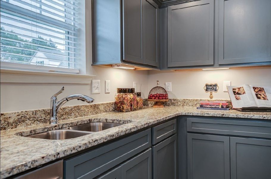 Kitchen.

*Photos are from a staged model home of floor plan. Options and Selections may vary in actual home.