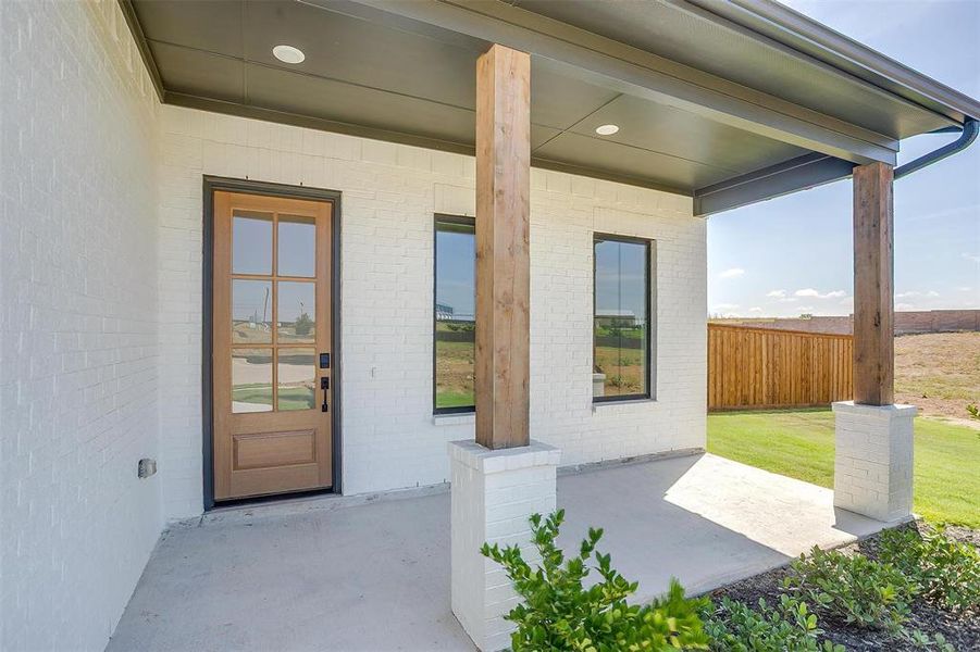 Exterior details and patio area of a home in Sweetgrass, Haslet (Image 3). Exterior details and patio area of a home in Sweetgrass, Haslet (Image 3).