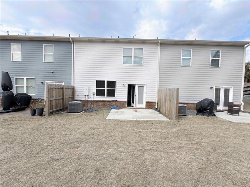 Exterior details and patio area of a home in , Buford (Image 16).