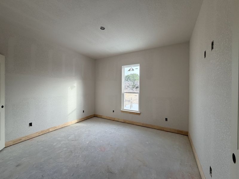 In-progress construction of a new home in Saddle Crest Estates, Weatherford, TX (Image 20).