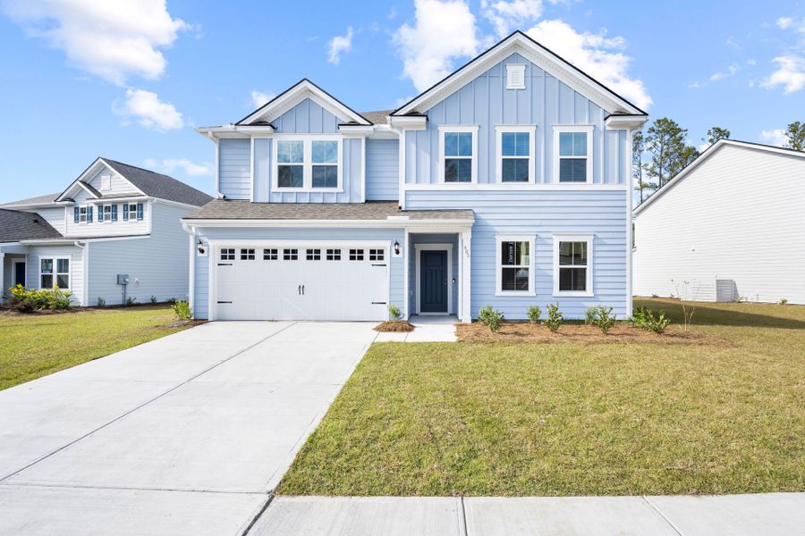 Front exterior of a new home in Waterways, Richmond Hill, GA, highlighting curb appeal (Image 2). Front exterior of a new home in Waterways, Richmond Hill, GA, highlighting curb appeal (Image 2).