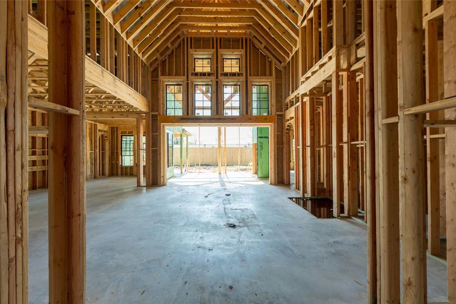Framed by height and flooded with natural light, this central living space is designed to feel both grand and grounded, inviting connection at every level.