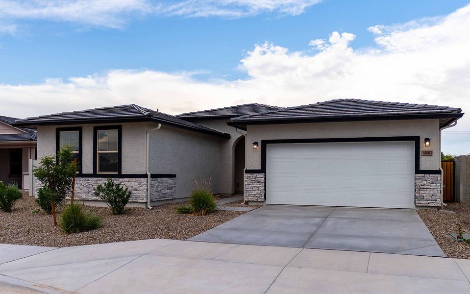 Front exterior of a new home in Rancho Mirage, Maricopa, AZ, highlighting curb appeal (Image 2).