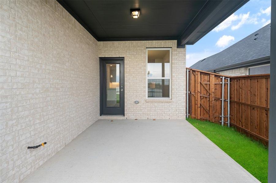 Exterior details and patio area of a home in Walden Pond, Forney (Image 3).