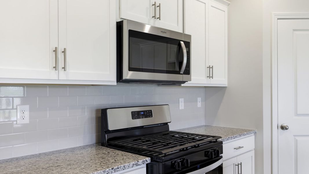 Furnished interior view inside a new home in Tap Root Farms, Fletcher (Image 9).