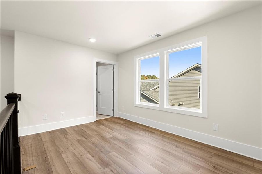 Spacious, unfurnished interior of a new home in Hillgrove Preserve, Powder Springs (Image 34).