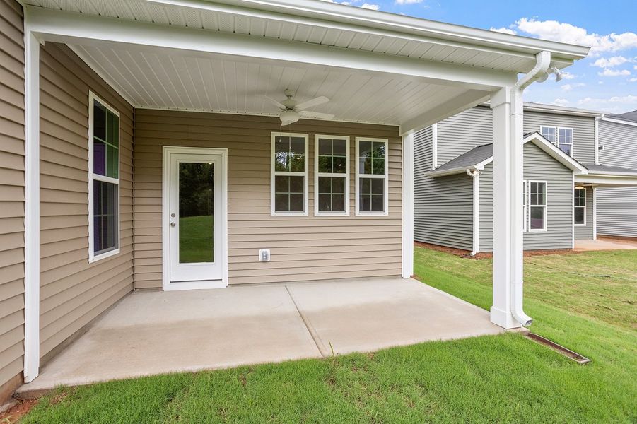 Exterior details and patio area of a home in Renaissance at White Oak, Garner (Image 4). Exterior details and patio area of a home in Renaissance at White Oak, Garner (Image 4).
