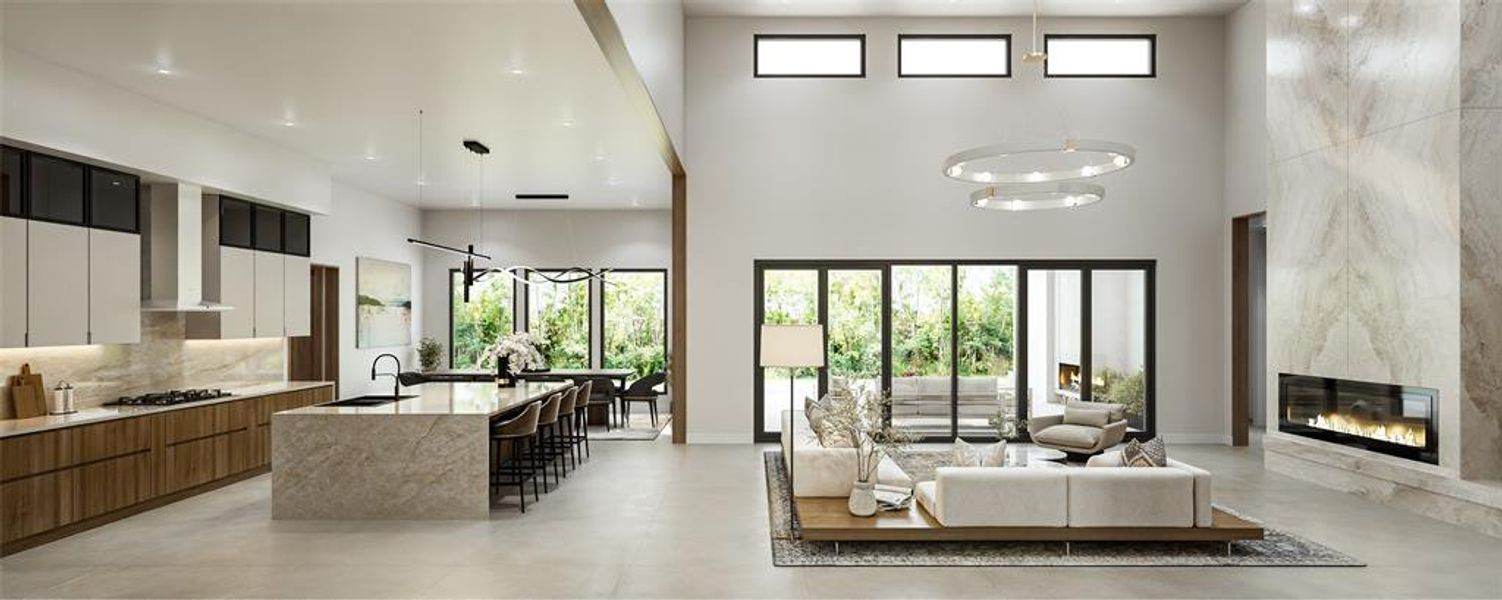 Open-concept living space with a double-height ceiling and floor-to-ceiling sliding glass doors
