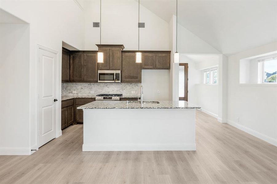 Furnished interior view inside a new home in Union Park Classic 60, Little Elm (Image 8). Furnished interior view inside a new home in Union Park Classic 60, Little Elm (Image 8).