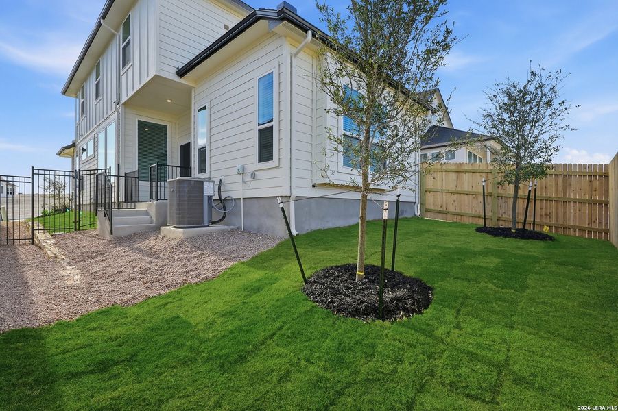 Exterior details and patio area of a home in Prominence, San Antonio (Image 23).