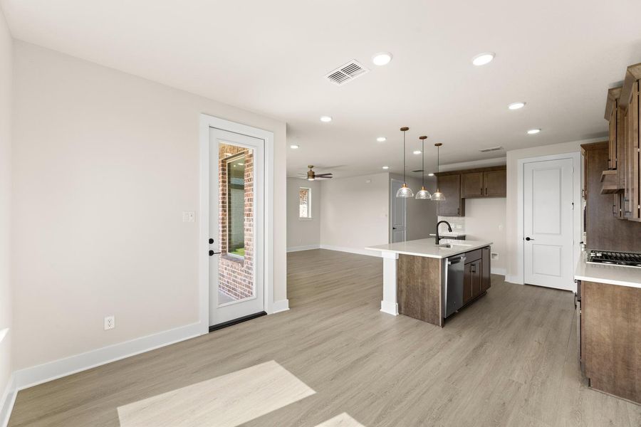 Furnished interior view inside a new home in Garden Collection at Union Park, Little Elm (Image 7).