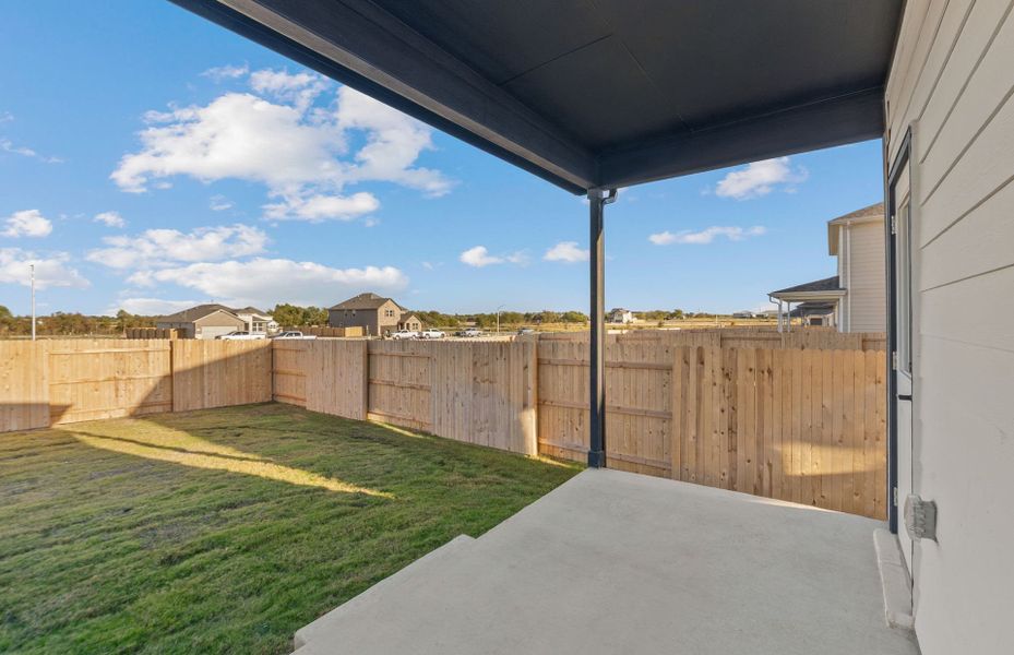Exterior details and patio area of a home in Patterson Ranch, Georgetown (Image 23).