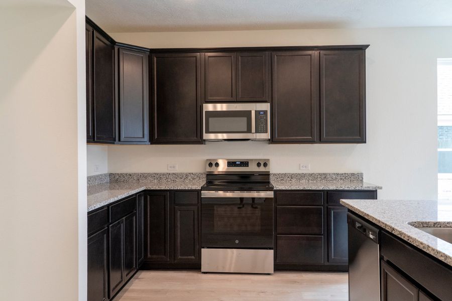 Furnished interior view inside a new home in Pecan Grove, Navasota (Image 3).