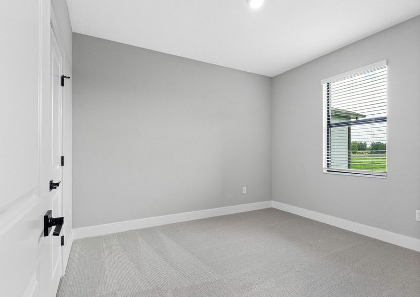 Each secondary bedroom includes carpet, a closet and a bright window