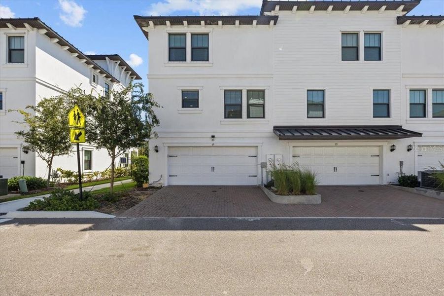Exterior details and patio area of a home in , Tampa (Image 24).