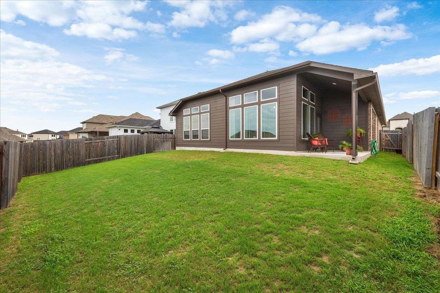 Front exterior of a new home in , Buda, TX, highlighting curb appeal (Image 2). Front exterior of a new home in , Buda, TX, highlighting curb appeal (Image 2).