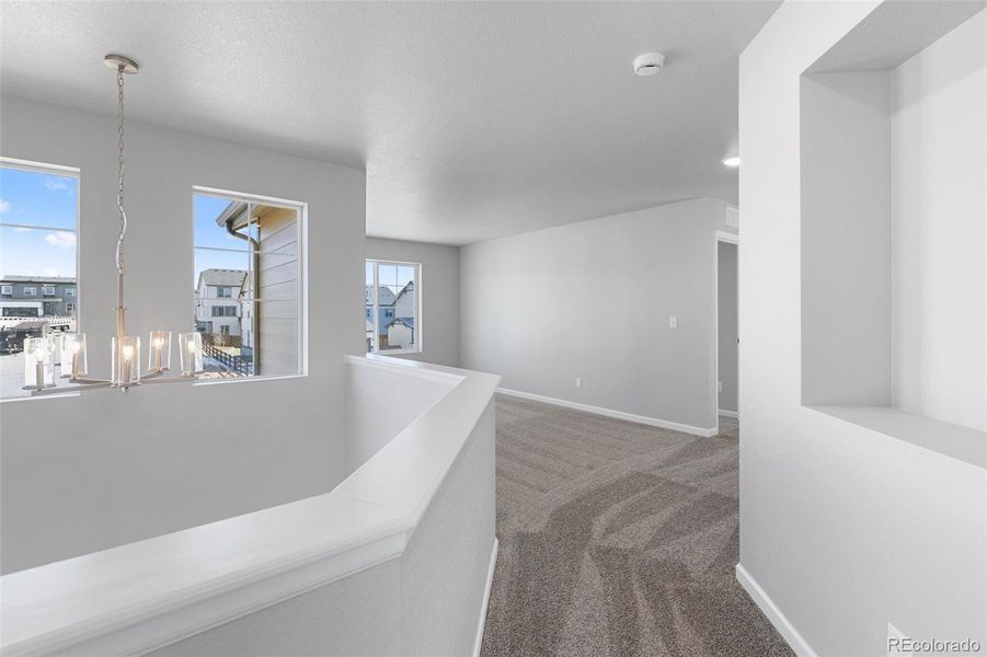 Spacious, unfurnished interior of a new home in Highlands Preserve, Mead (Image 22).