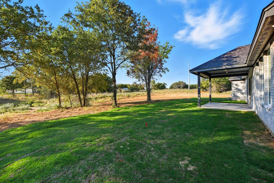 Representative exterior details of a home built from the Garrison III by Cheldan Homes in Arbor Oaks, Boyd (Image 23).