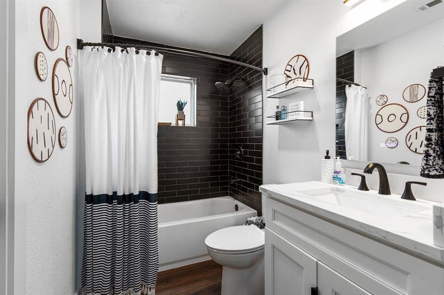 The shared bathroom in this guest home, beautifully designed.