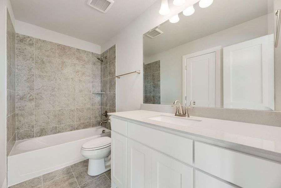 Furnished interior view inside a new home in Park Trails, Forney (Image 9).
