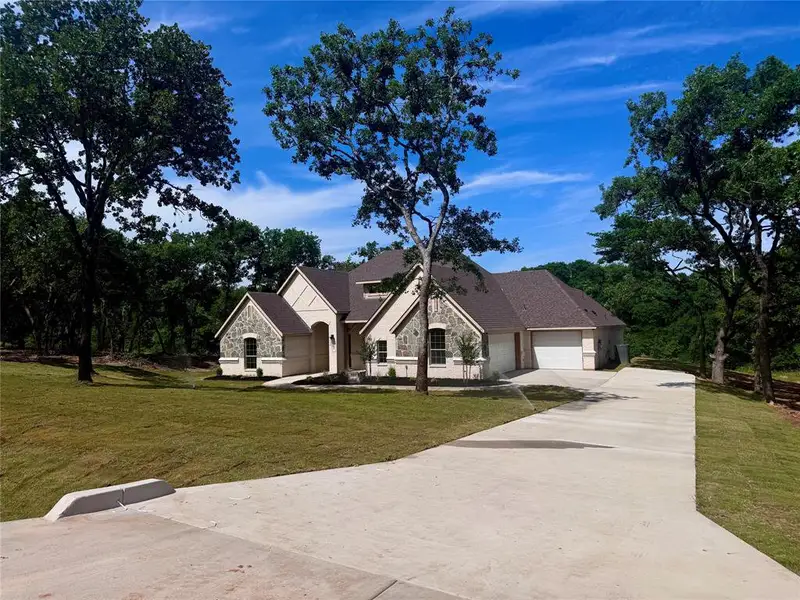 Front exterior of a new home in , Weatherford, TX, highlighting curb appeal (Image 1). Front exterior of a new home in , Weatherford, TX, highlighting curb appeal (Image 1).