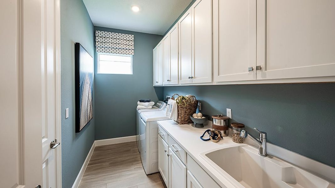 Representative furnished interior of a home built from the Farnese by Taylor Morrison in Astor Creek Golf and Country Club, Port St. Lucie (Image 28).