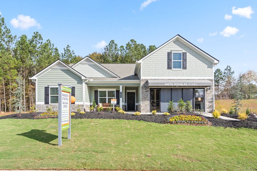 Front exterior of a new home in Maddox Station, Eatonton, GA, highlighting curb appeal (Image 1). Front exterior of a new home in Maddox Station, Eatonton, GA, highlighting curb appeal (Image 1).