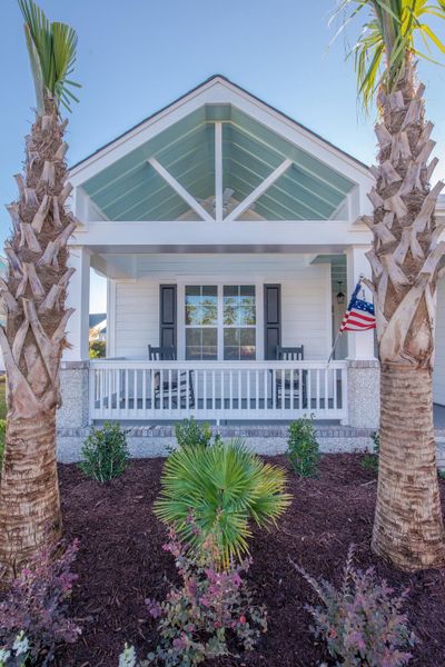 Representative exterior photo of a completed home built from the Kauai by Bill Clark Homes in Osprey Landing, Southport, NC (Image 29). Representative exterior photo of a completed home built from the Kauai by Bill Clark Homes in Osprey Landing, Southport, NC (Image 29).