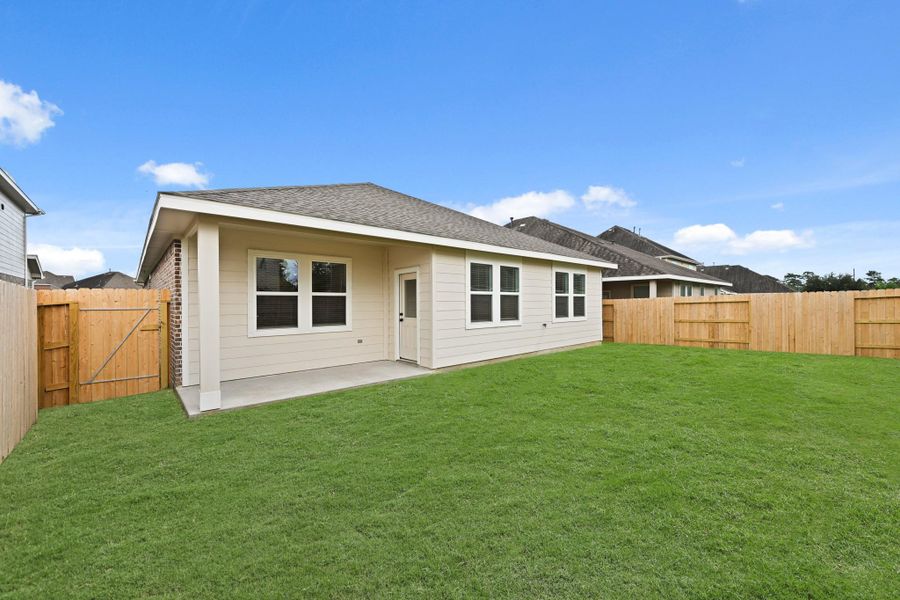 Backyard with covered patio Backyard with covered patio