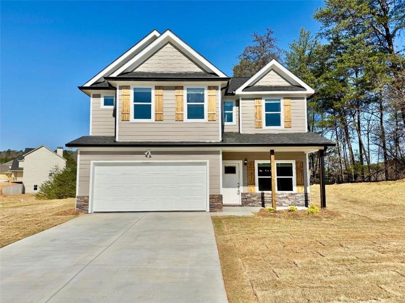 Front exterior of a new home in , Lula, GA, highlighting curb appeal (Image 1). Front exterior of a new home in , Lula, GA, highlighting curb appeal (Image 1).
