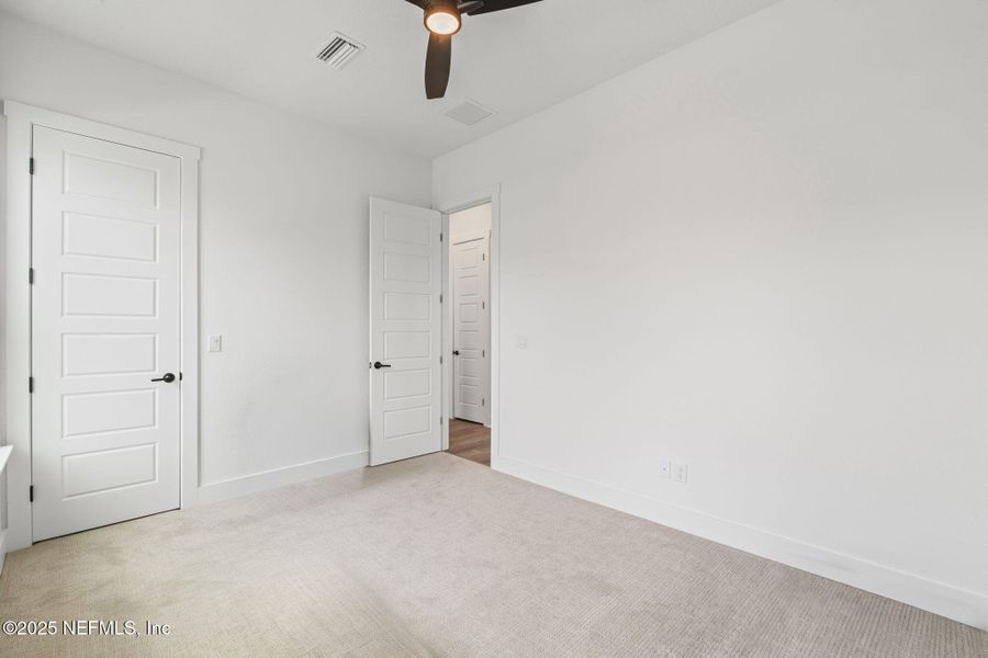 Spacious, unfurnished interior of a new home in Seven Pines 50' Rear Entry, Jacksonville (Image 65).