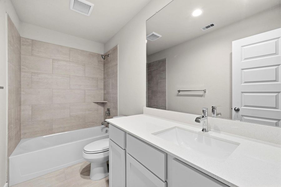 Furnished interior view inside a new home in Sunterra Lakes, Fulshear (Image 9). Furnished interior view inside a new home in Sunterra Lakes, Fulshear (Image 9).