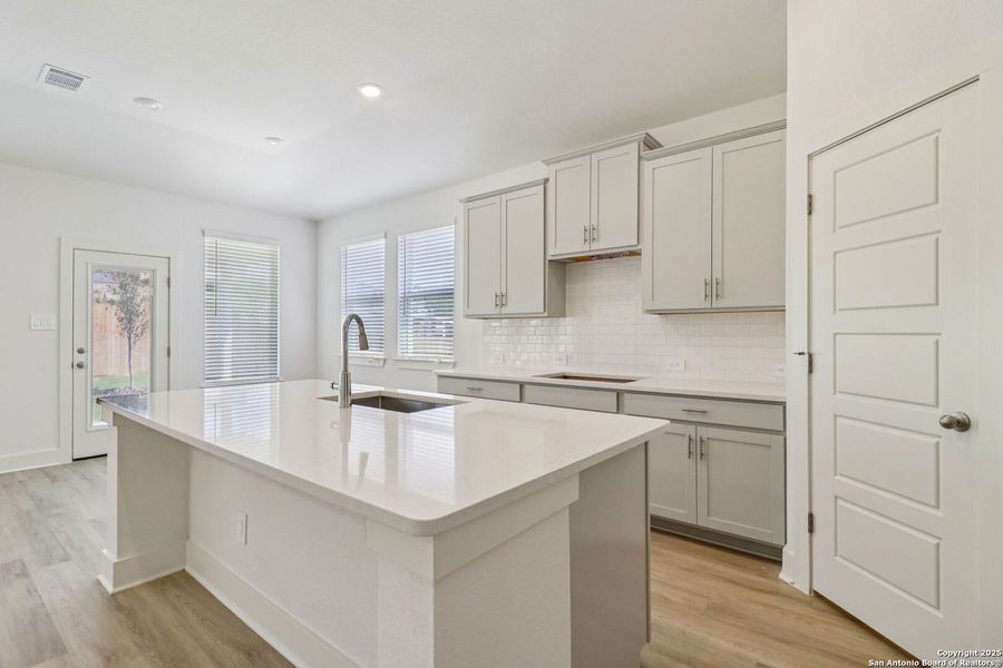 Furnished interior view inside a new home in Sagebrooke - Classic Series, San Antonio (Image 3). Furnished interior view inside a new home in Sagebrooke - Classic Series, San Antonio (Image 3).