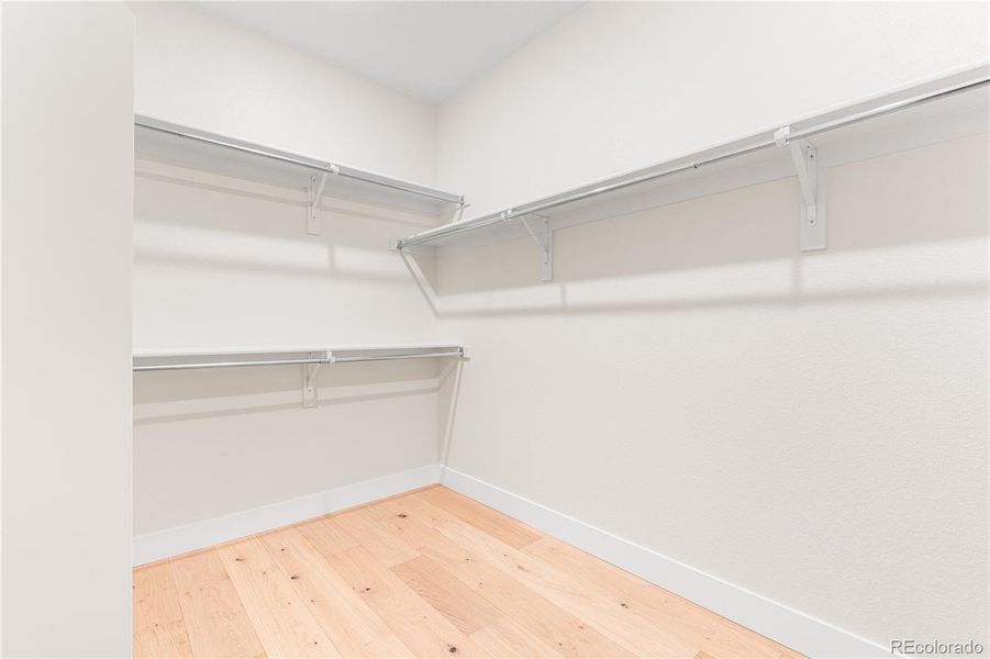 Spacious, unfurnished interior of a new home in Luxe at The Canyons, Castle Pines (Image 49).