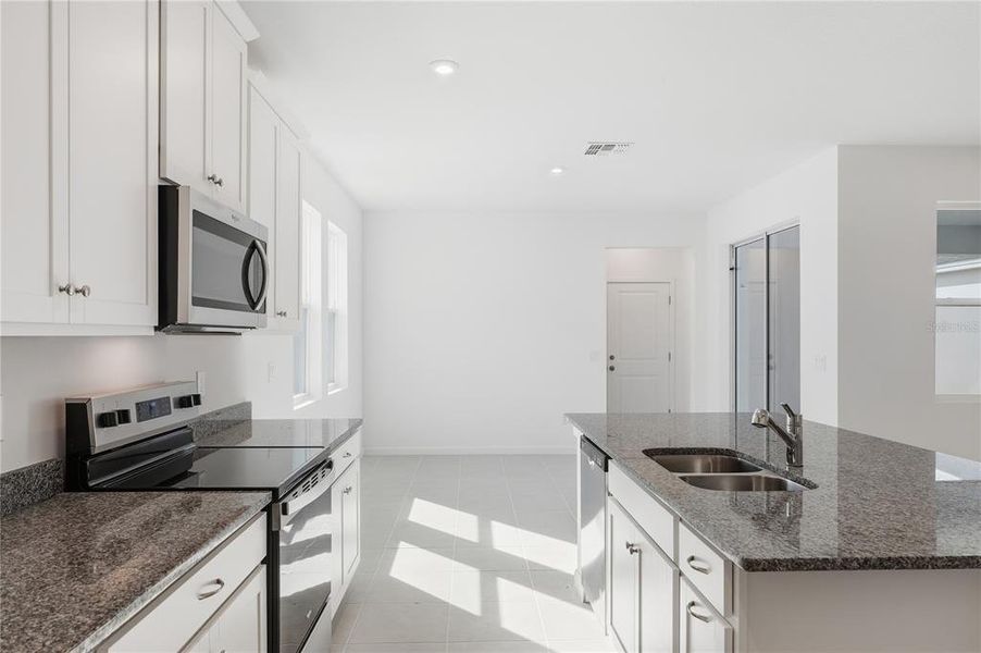 Furnished interior view inside a new home in Rainwood, Clermont (Image 10).