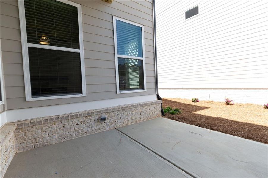 Exterior details and patio area of a home in Waterside Single Family, Peachtree Corners (Image 4).