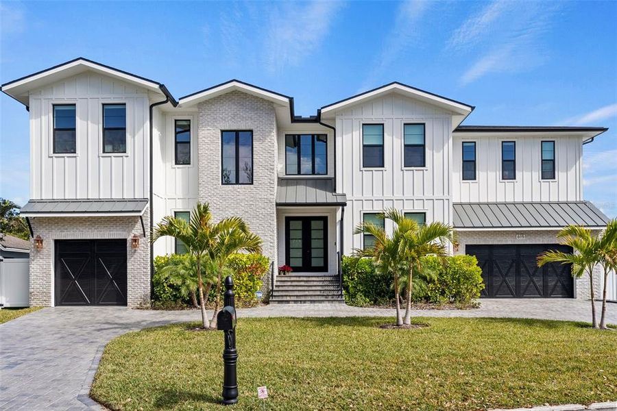 Front exterior of a new home in , Tampa, FL, highlighting curb appeal (Image 29).