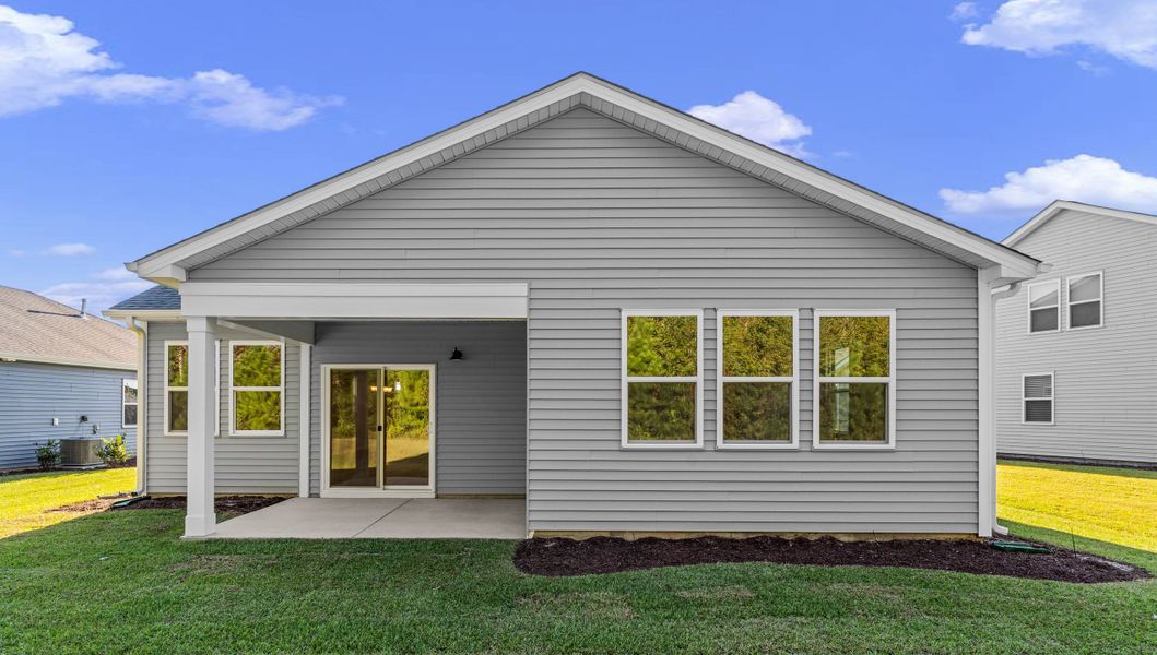 Exterior details and patio area of a home in Heritage Park at Longs, Longs (Image 3).