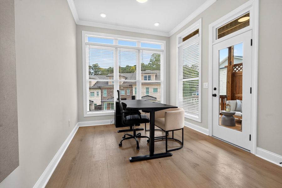 Representative furnished interior of a home built from the The Benton IV by The Providence Group in Ward's Crossing Townhomes, Johns Creek (Image 28).