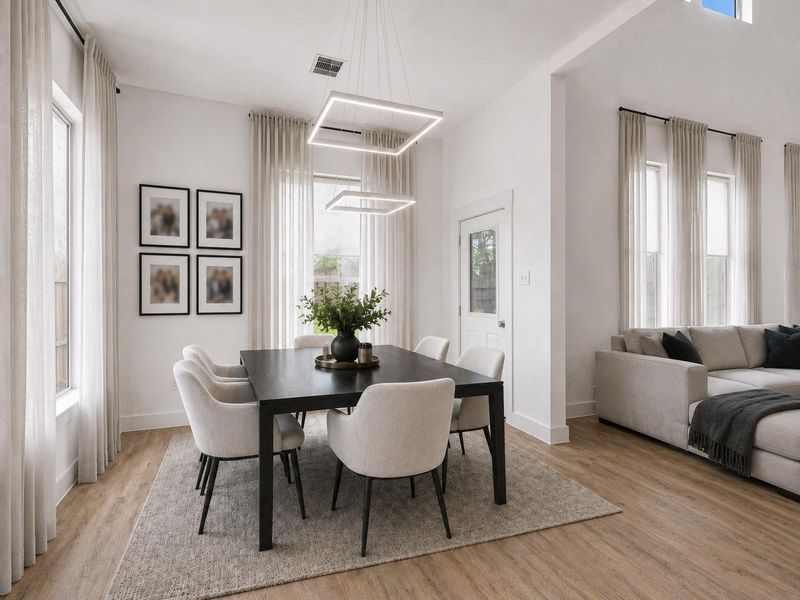 The dining area is surrounded by natural light and offers easy access to the backyard — perfect for indoor-outdoor living. (Virtually staged) The dining area is surrounded by natural light and offers easy access to the backyard — perfect for indoor-outdoor living. (Virtually staged)