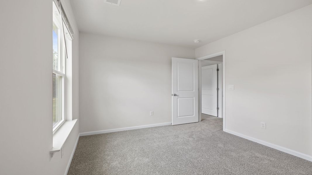 Spacious, unfurnished interior of a new home in Treemont Commons, Wellford (Image 22).