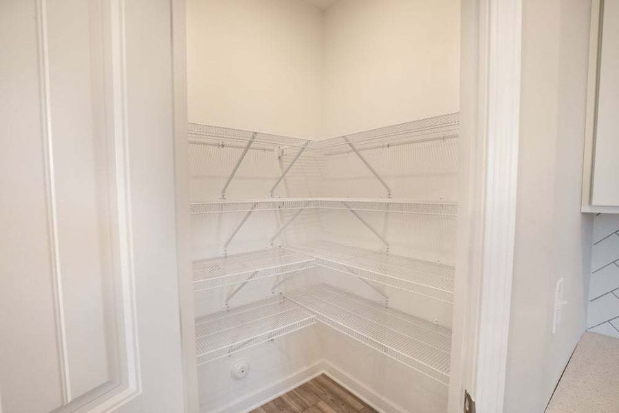 Representative unfurnished interior of a home built from the Drayton by Caviness & Cates Communities in Bartlett Manor, Youngsville (Image 77).