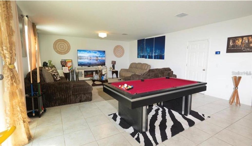 Furnished interior view inside a new home in Lake Deer Estates - Signature Series, Poinciana (Image 10).