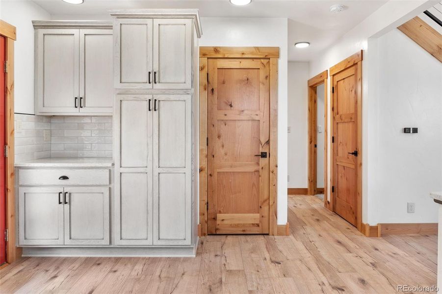 Awesome custom cabinetry in the kitchen with coffee counter