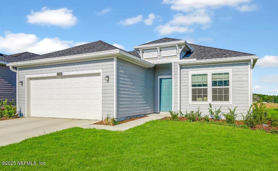 Front exterior of a new home in Edenbrooke at Hyland Trail | 55+: Edenbrooke at Hyland Trail 50s, Green Cove Springs, FL, highlighting curb appeal (Image 1).