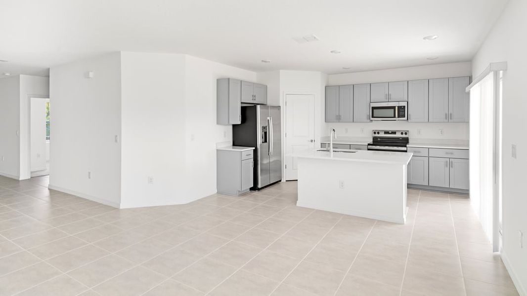 Representative unfurnished interior of a home built from the Ambrosia by Taylor Morrison in Aden South at Westview, Kissimmee (Image 12).