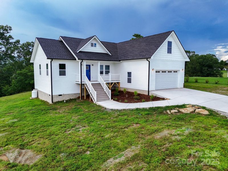 Front exterior of a new home in , Hendersonville, NC, highlighting curb appeal (Image 29). Front exterior of a new home in , Hendersonville, NC, highlighting curb appeal (Image 29).