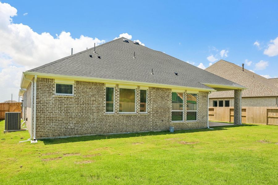 Exterior details and patio area of a home in , Mont Belvieu (Image 22).