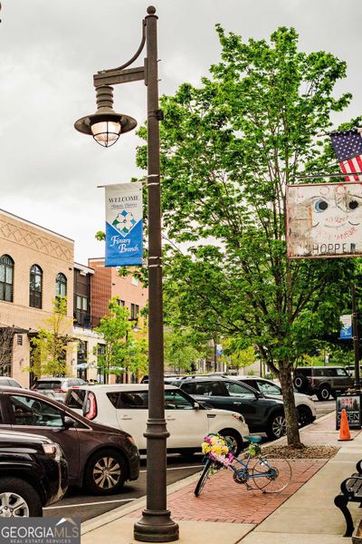 Front exterior of a new home in Ponderosa Farms Manor, Gainesville, GA, highlighting curb appeal (Image 40).