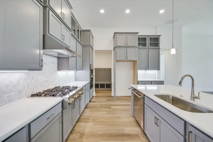 Furnished interior in a model home at Whispering Wind in Bertram (Image 5).